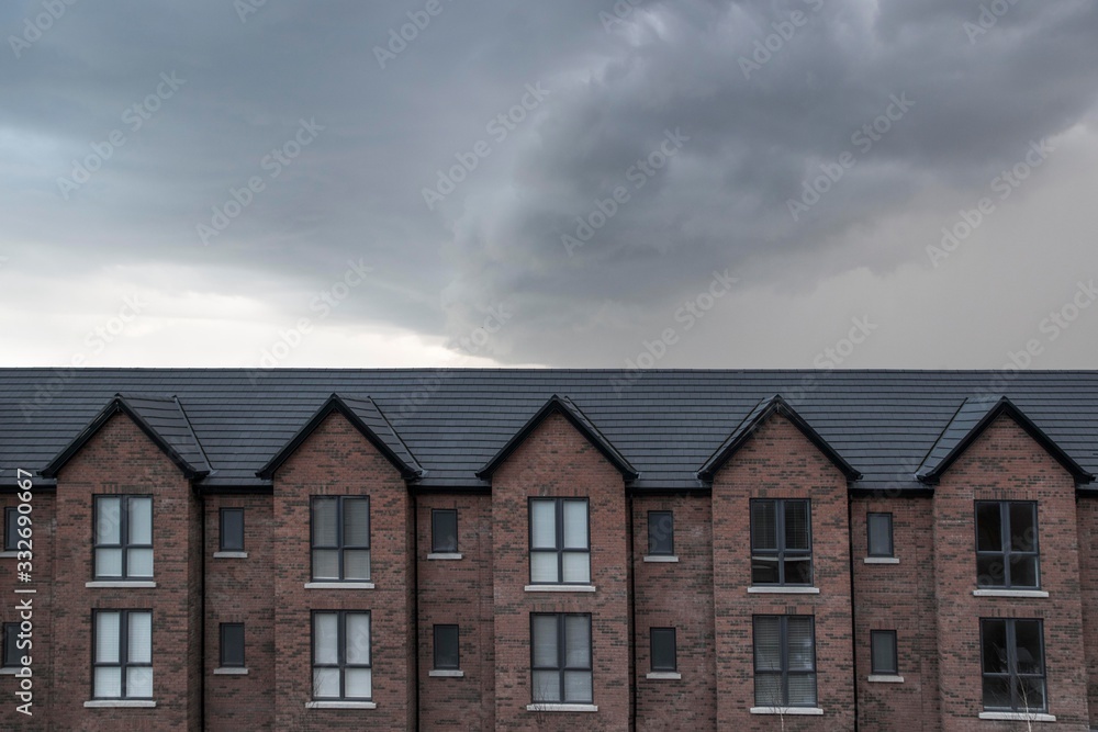 Housing District In England Facing Big Storm / Neighbourhood Houses Buildings Accomodation Homes Residence / Urban Architecture Housing District In England Facing Big Storm / Neighbourhood Houses Buildings Accomodation Homes Residence / Urban Architecture