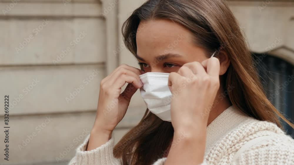Virus mask spanish woman on street wearing face protection in prevention for coronavirus covid 19. Lady walking in public space on quarantine for food Virus mask spanish woman on street wearing face protection in prevention for coronavirus covid 19. Lady walking in public space on quarantine for food