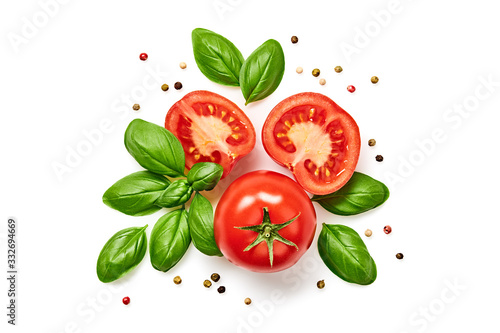 Tomato cherry, basil, spices, pepper. Fresh organic tomatoes, isolated on white. Vegan veggies diet food. Basil, herb and cherry tomatoes, cooking concept, top view.