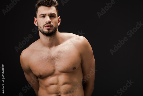 muscular sexy naked man isolated on black