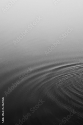 Ripples in water black and white sea photography calm water surface tranquil serene ocean water foggy sea