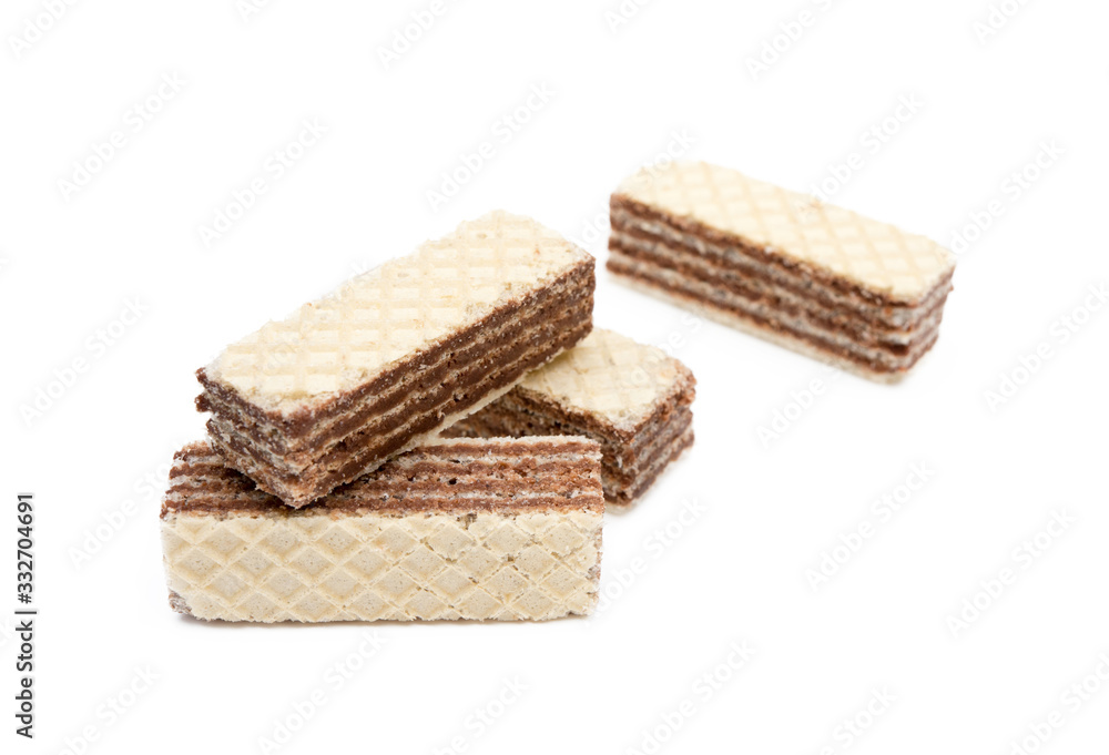 Crispy wafers with creamy hazelnut filling isolated on white background Crispy wafers with creamy hazelnut filling isolated on white background