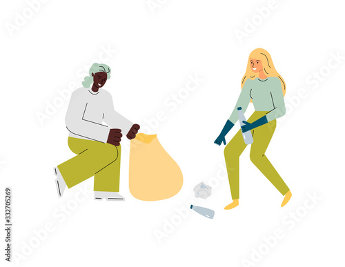 Two volunteer women picking up garbage into trash bags and smiling