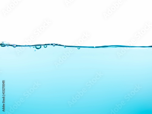 Water and air bubbles over white background.