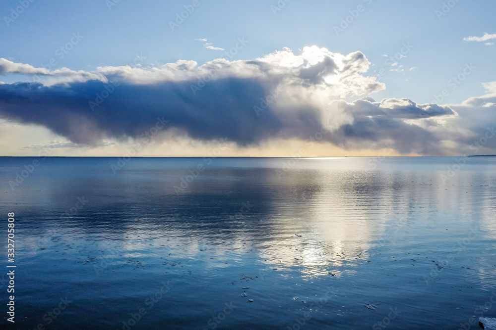 Fototapeta premium Aerial view of the ice texture floating on the water surface of the Gulf of Finland