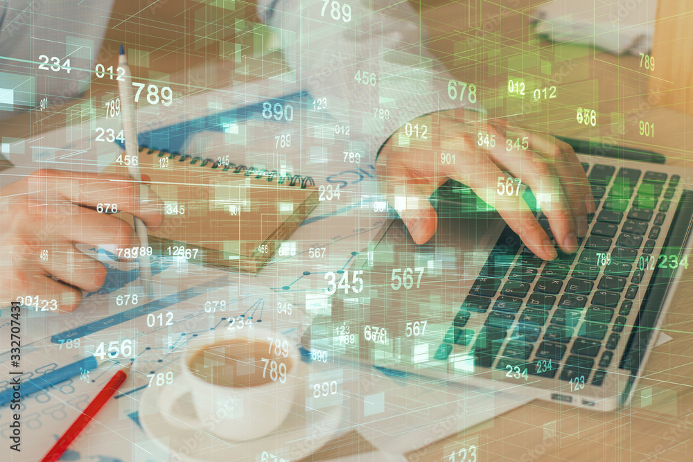 Double exposure of data internet theme hologram with man working on computer on background. Concept of innovation. Double exposure of data internet theme hologram with man working on computer on background. Concept of innovation.