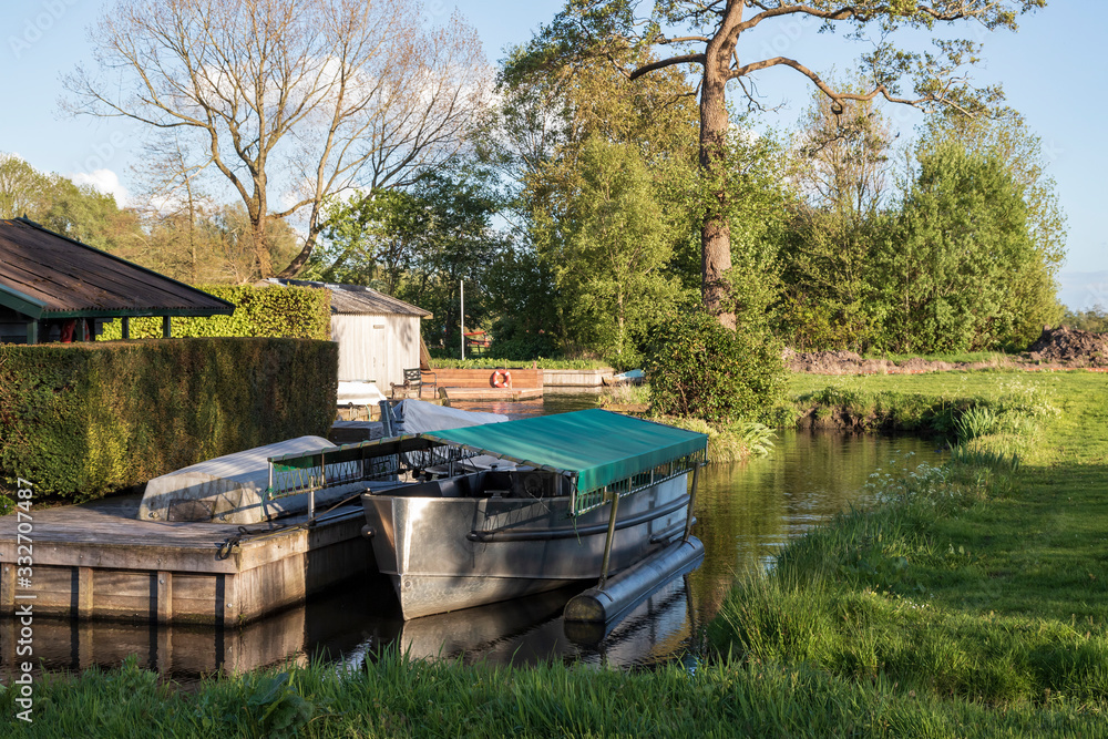 Anchored bed on canal at Glimmen, Holland. Anchored bed on canal at Glimmen, Holland.