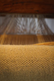weaving loom in rustic wool
