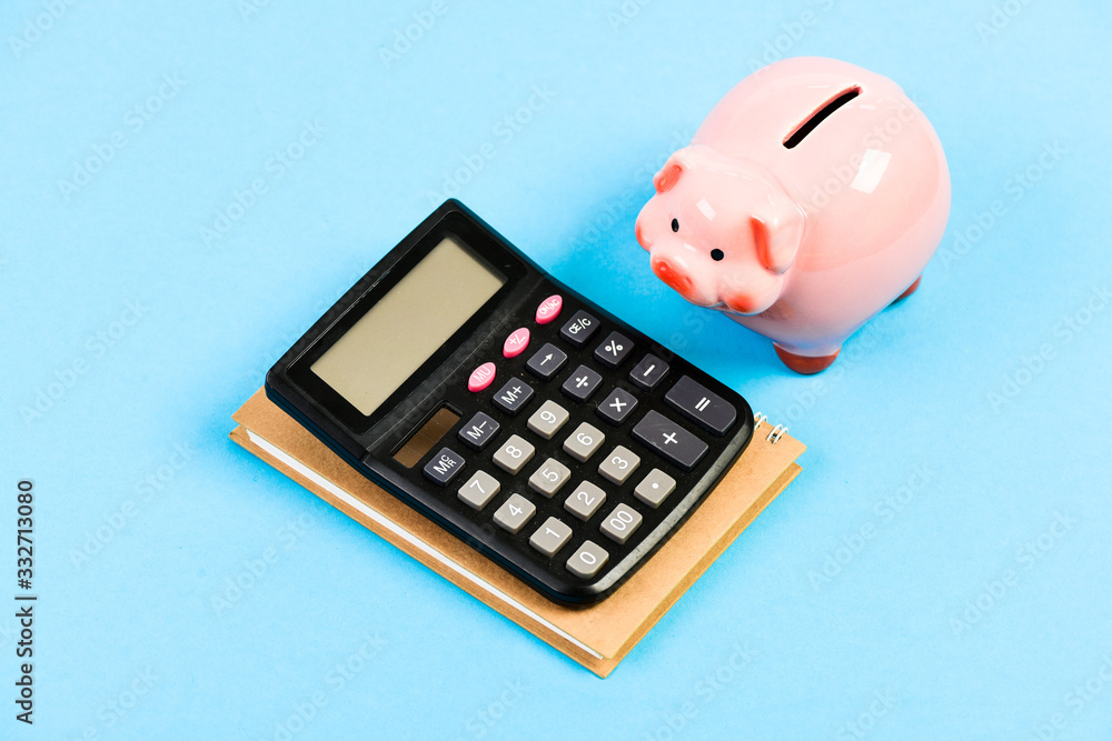 Calculate profit. Finance manager wanted. Trading exchange. Trade market. Finance department. Credit debt concept. Economics and finance. Piggy bank pink pig and calculator. Business administration Calculate profit. Finance manager wanted. Trading exchange. Trade market. Finance department. Credit debt concept. Economics and finance. Piggy bank pink pig and calculator. Business administration