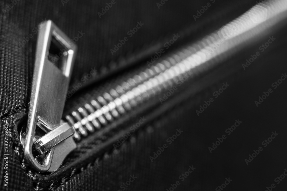 Zip fastener on black handbag Zip fastener on black handbag