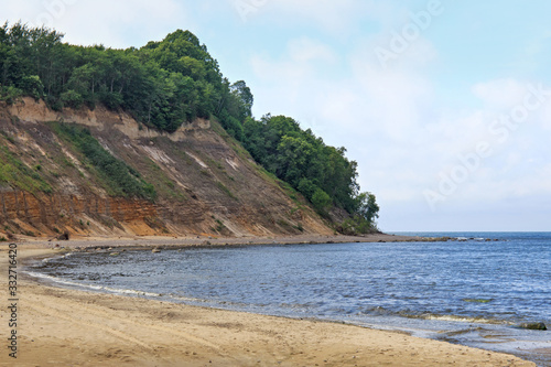Beautiful landscape of the sandy cliffs and a beautiful cove on the Baltic Sea.