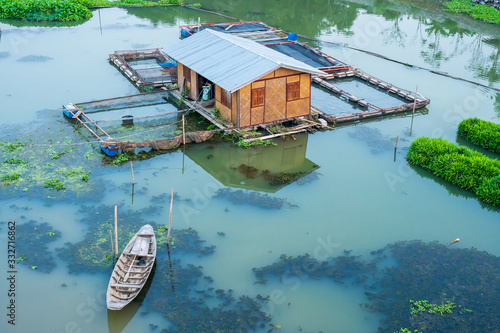 Raft, floating house, Sakae Krang river community, Uthai Thani Province, Thailand photo