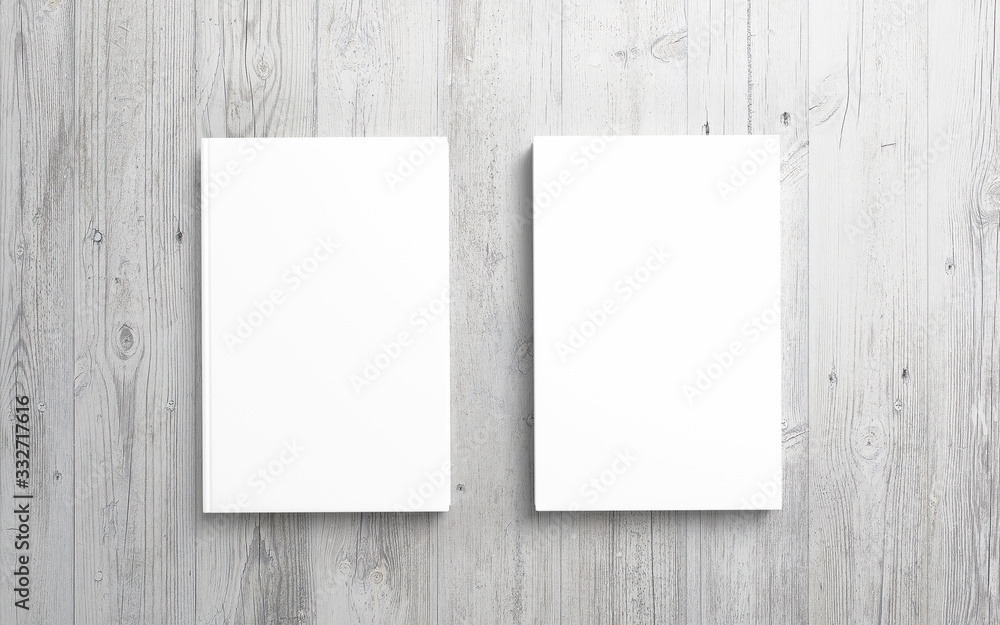 2 books with blank white hardcover on wooden desk background as template for your design presentation, promotion etc. 2 books with blank white hardcover on wooden desk background as template for your design presentation, promotion etc.