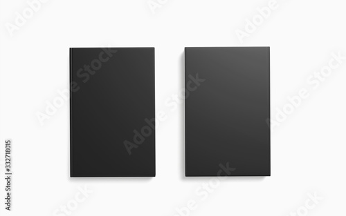 2 books with blank black hardcover isolated on white as template for your design presentation, promotion etc.