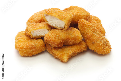 homemade chicken nuggets isolated on white background photo