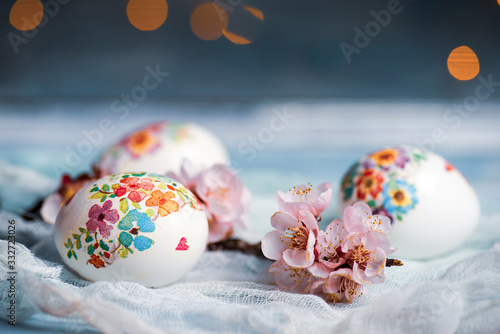 Decoupage decorated Easter eggs with cherry blossom