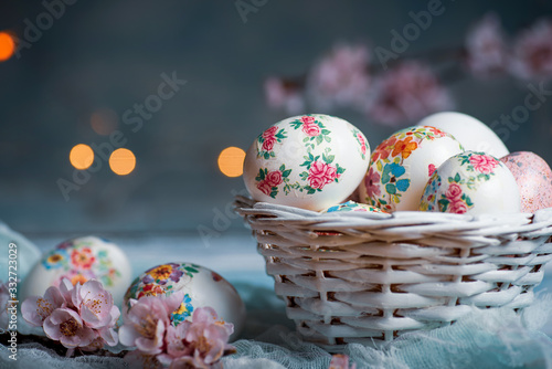 Decoupage decorated Easter eggs with cherry blossom
