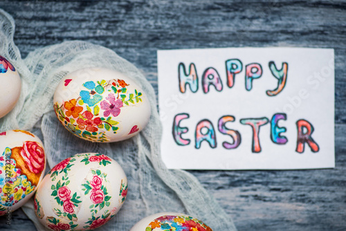 Decoupage decorated Easter eggs with flower pattern