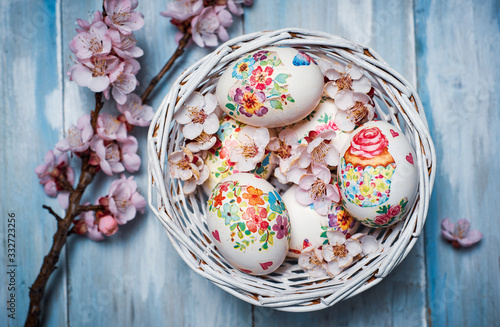 Decoupage decorated Easter eggs with cherry blossom