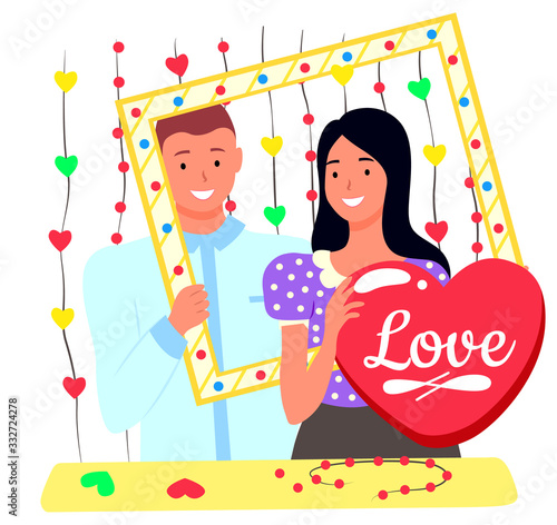 Smiling man and woman standing together, people with photozone accessories. Lovers posing for photoshooting, wedding or romantic day. Location with heart decoration, photo of wife and husband vector
