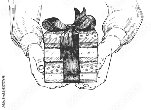 Greeting with gift box in human palm