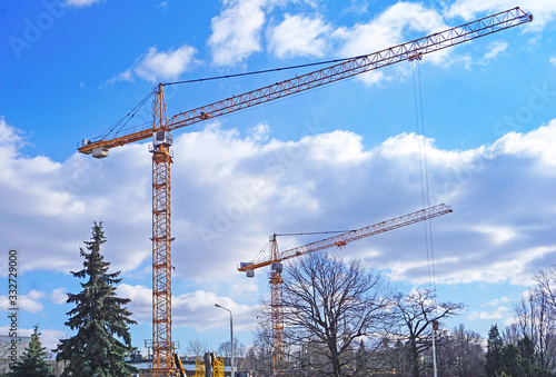 construction cranes on a construction site photo