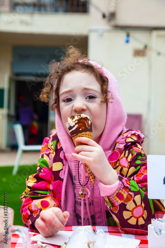 Little girl with ice cream expression