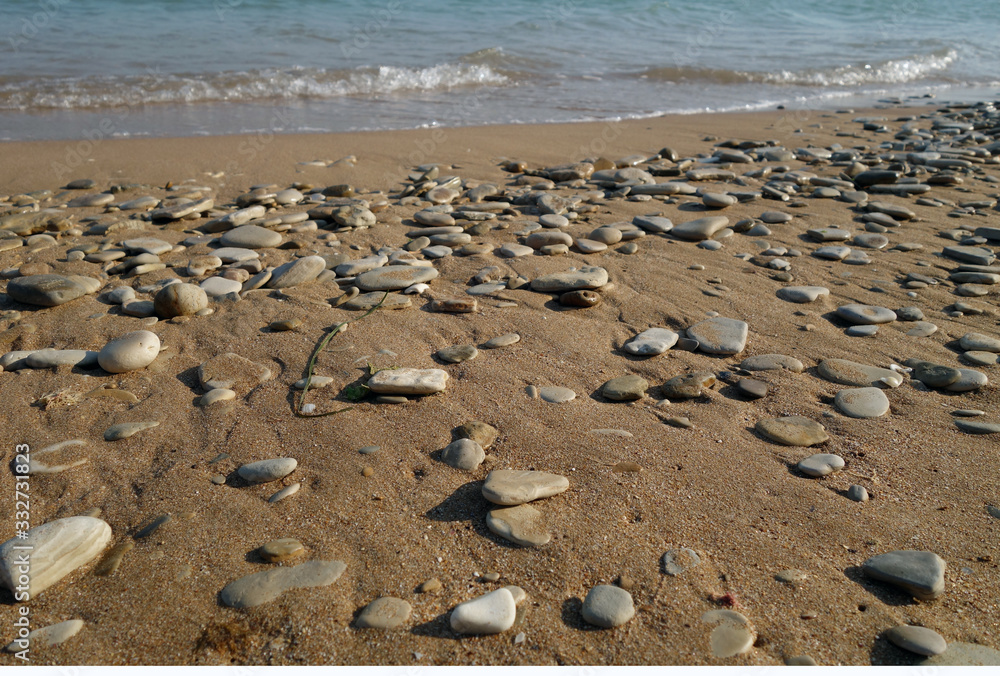 Small stones sand and sea wave. Small stones sand and sea wave.