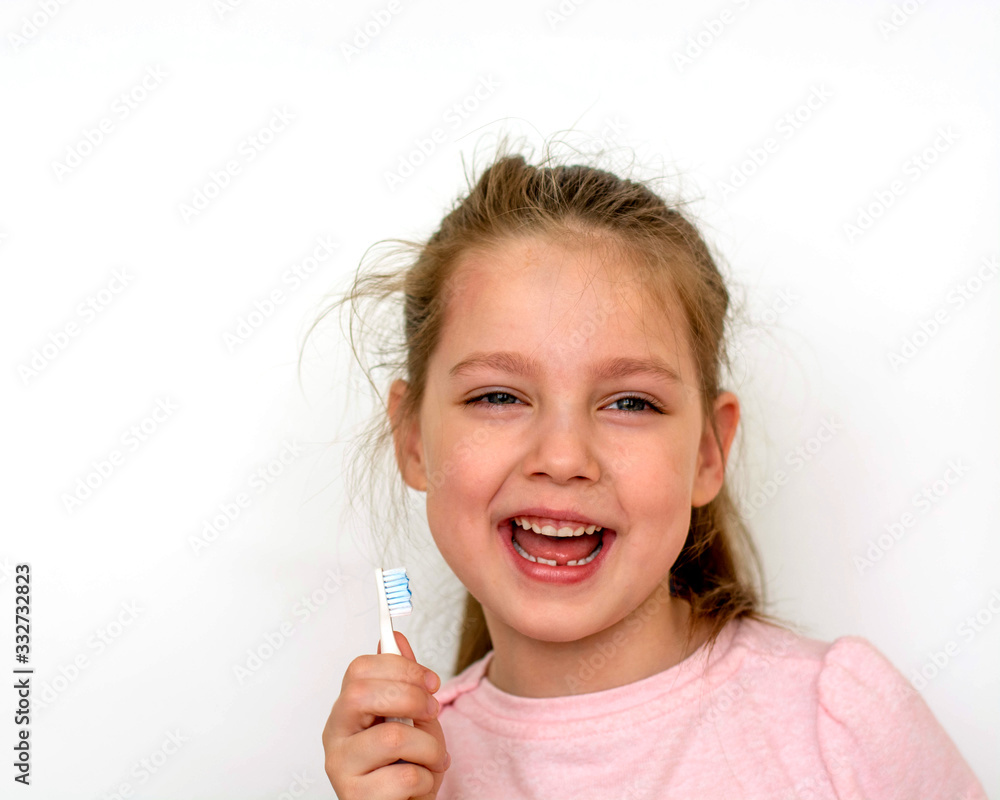 dental hygiene. happy little girl brushing her teeth dental hygiene. happy little girl brushing her teeth