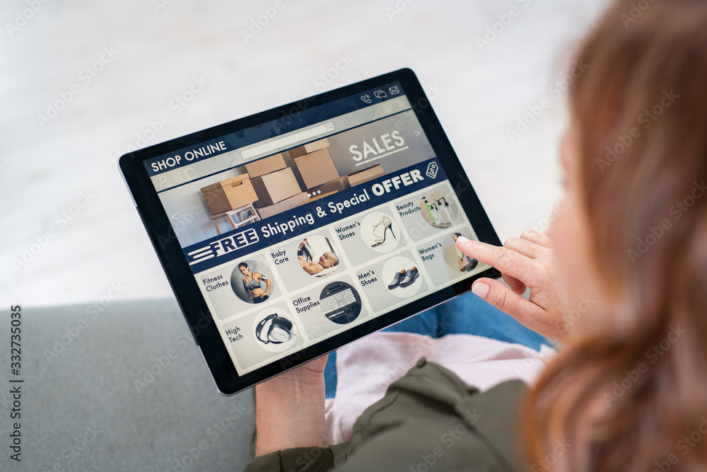 Woman doing shopping online with digital tablet Woman doing shopping online with digital tablet