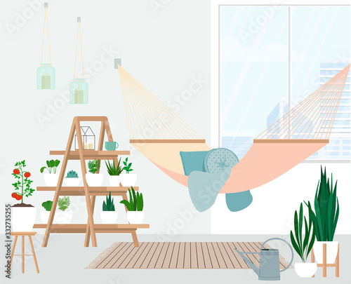 Hammock on the balcony in the urban mini garden.