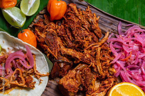 Cochinita Pibil, Mexican pit-roasted pork dish photo