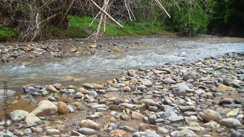 River water flow in the countryside, looks clear and gives a natural feel River water flow in the countryside, looks clear and gives a natural feel