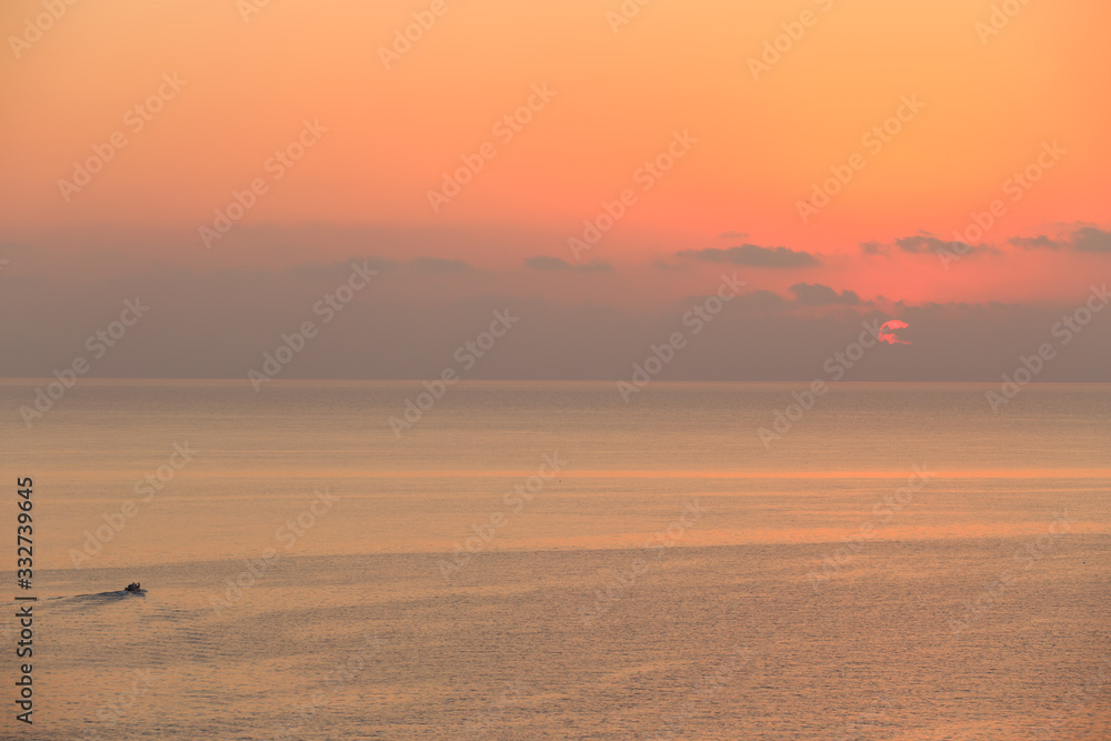 Sunrise over the sea in summer