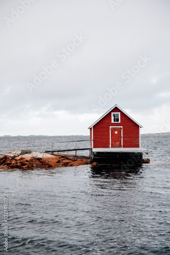 Beautiful red fishing stage in Fogo Island, Newfoundland photo