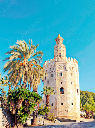 Tower of gold in Seville in the south of Spain in a sunny day. It´s atraction for the tourist.