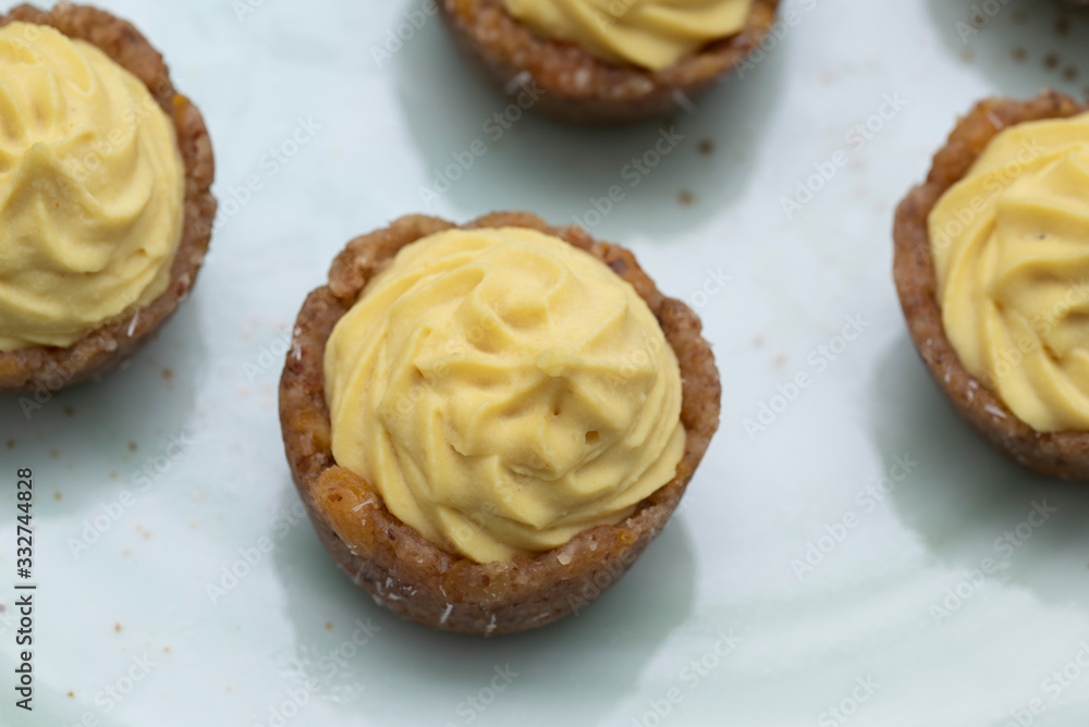 Mini raw vegan brioche with lemon and mint, a healthy and tasty dessert