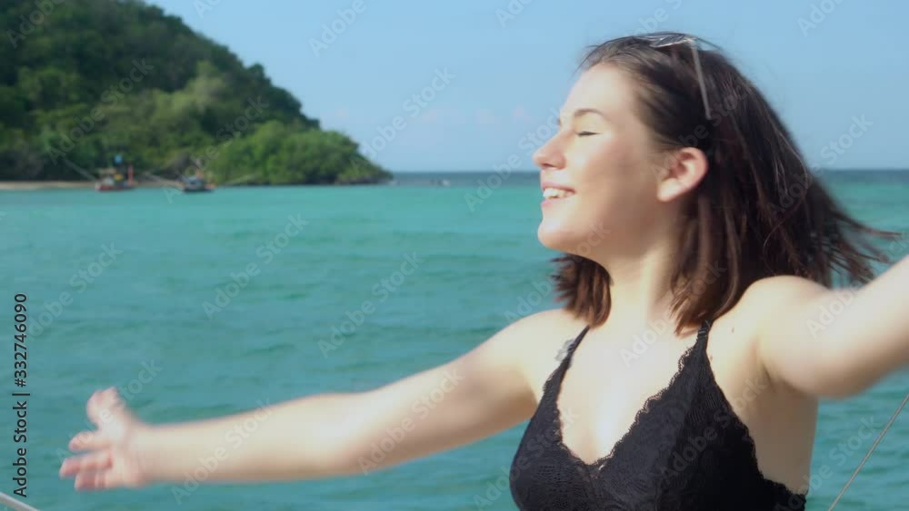Beautiful young woman in bikini sexy enjoy on yacht cruise for relax in the sea, travel to island with luxury in vacation on summer, happy girl to travel for leisure and fun in ship in holiday. Beautiful young woman in bikini sexy enjoy on yacht cruise for relax in the sea, travel to island with luxury in vacation on summer, happy girl to travel for leisure and fun in ship in holiday.
