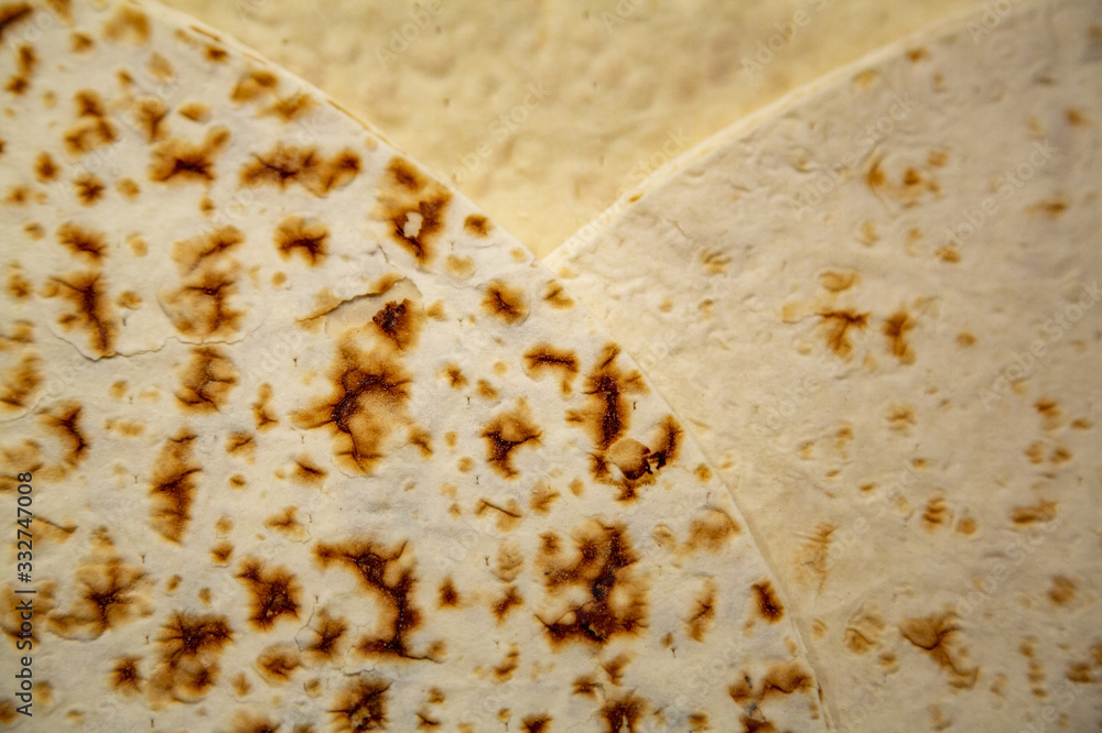 Textured surface of thin Armenian lavash. Traditional flour and water tortilla