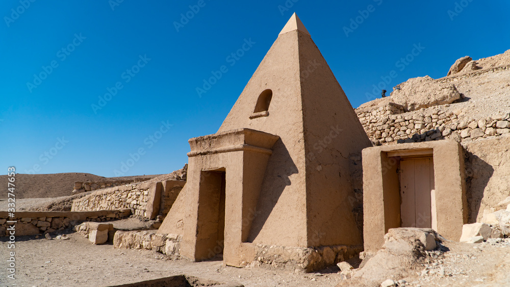 Luxor, Egypt: Deir el-Medina,is an ancient Egyptian village which was home to the artisans who worked on the tombs in the Valley of the Kings of the New Kingdom of Egypt.