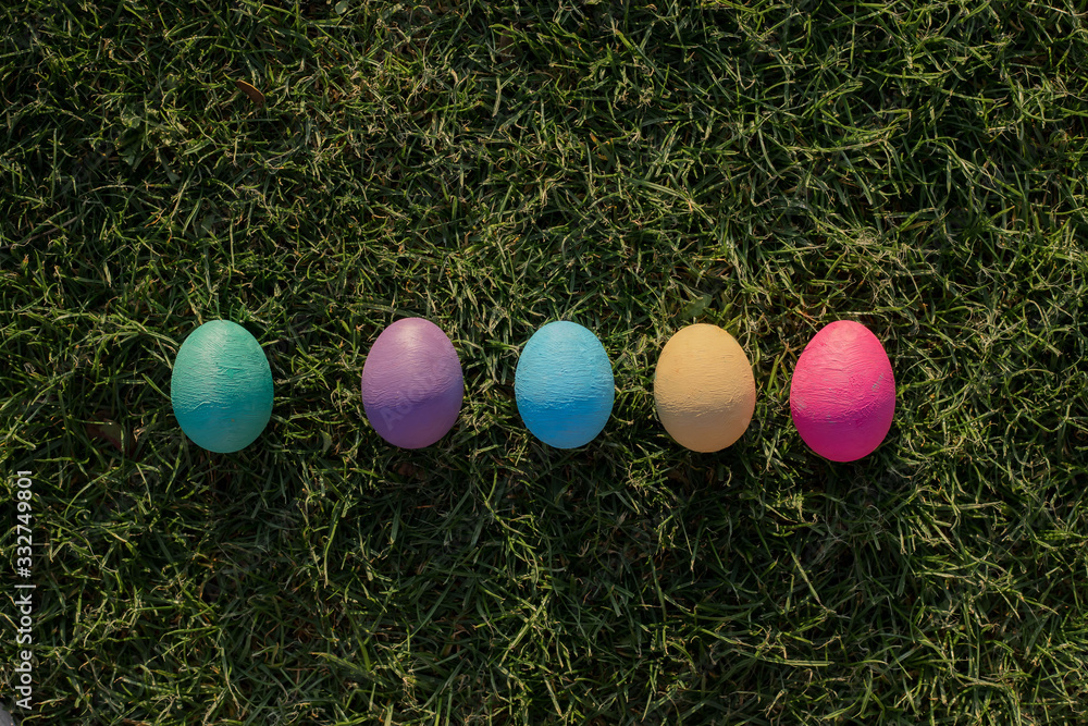 easter eggs on green grass lined
