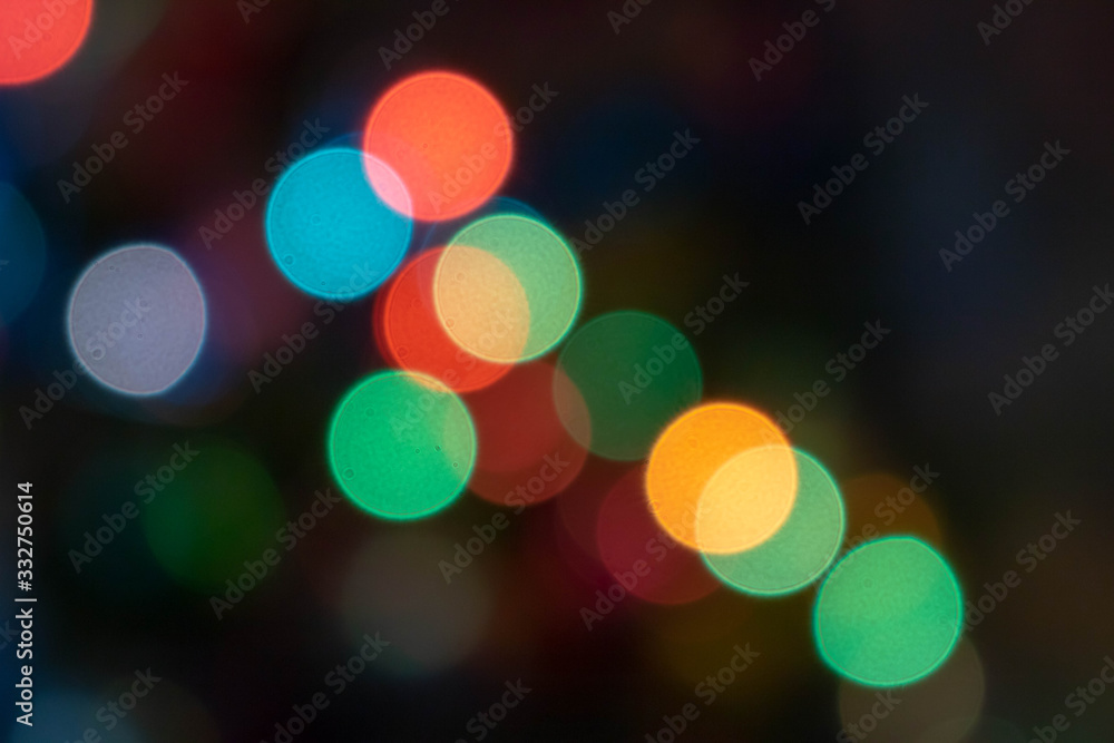 Colorful light bulbs and vivid round bokeh lights tree festive mood lightning Colorful light bulbs and vivid round bokeh lights tree festive mood lightning