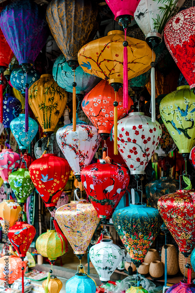Traditional colorful lanterns spread light on the old street of Hoi An Ancient Town - UNESCO World Heritage Site. Vietnam in 2019.