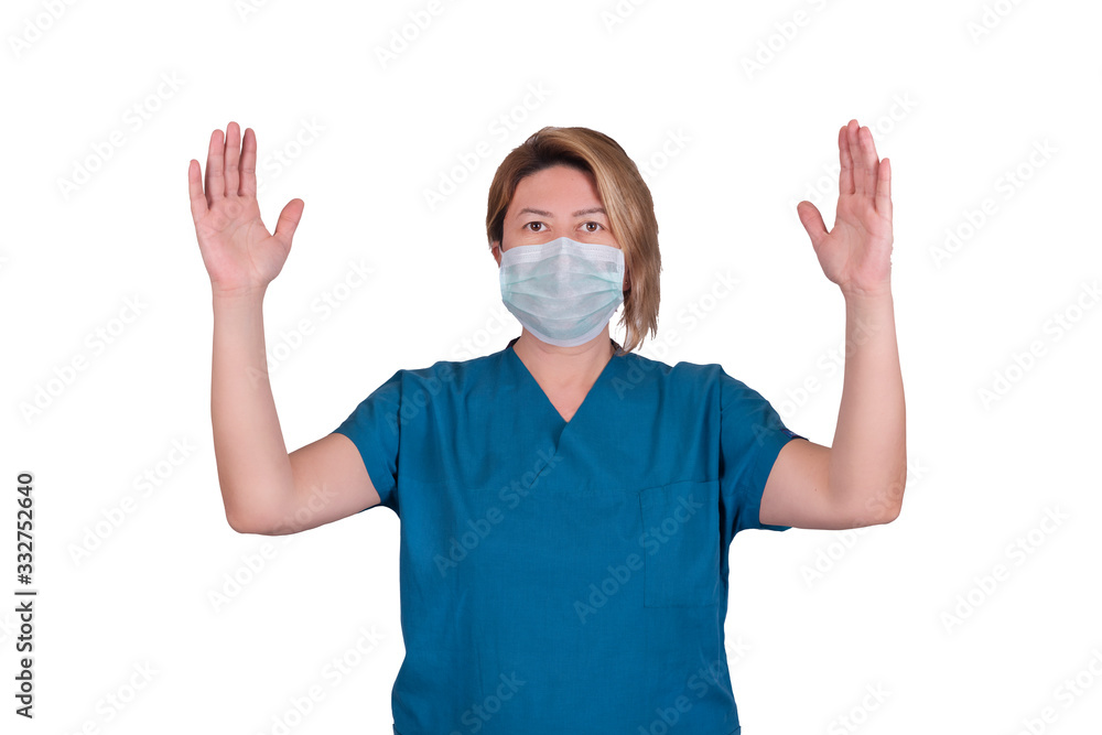 Female doctor wearing a mask and bonnet, corona virus protection methods and coronavirus sampling Doctors warn stay at home. Female doctor wearing a mask and bonnet, corona virus protection methods and coronavirus sampling Doctors warn stay at home.