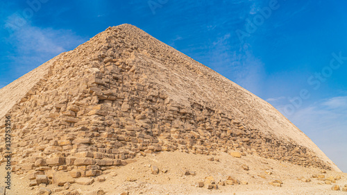 The Bent Pyramid is an ancient Egyptian pyramid located at the royal necropolis of Dahshur  approximately 40 kilometres south of Cairo  built under the Old Kingdom Pharaoh Sneferu. Egypt