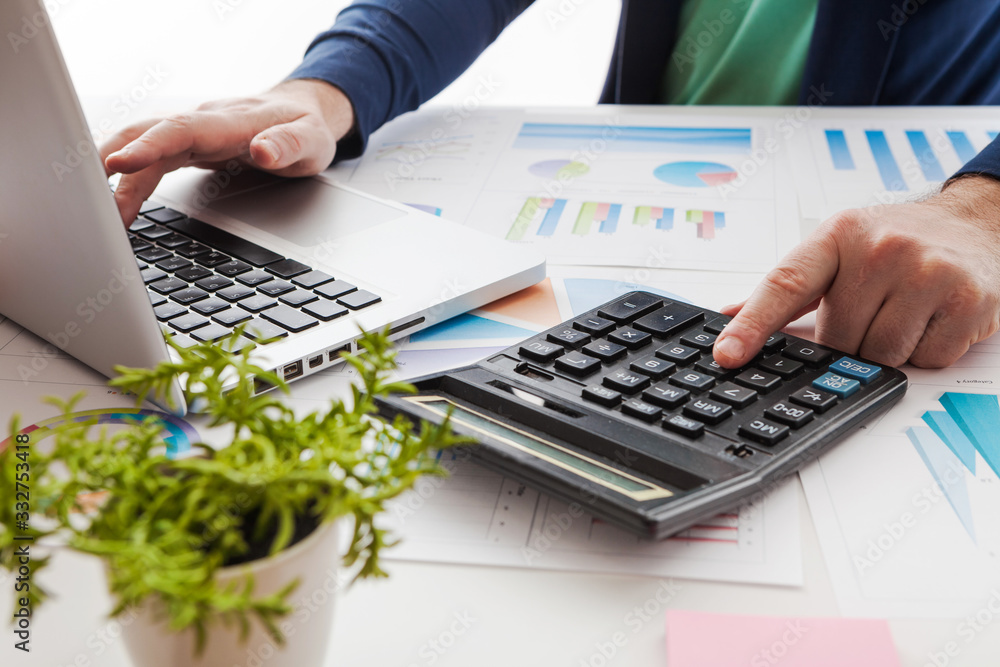 stock market chart and finger pointing on tablet in office stock market chart and finger pointing on tablet in office