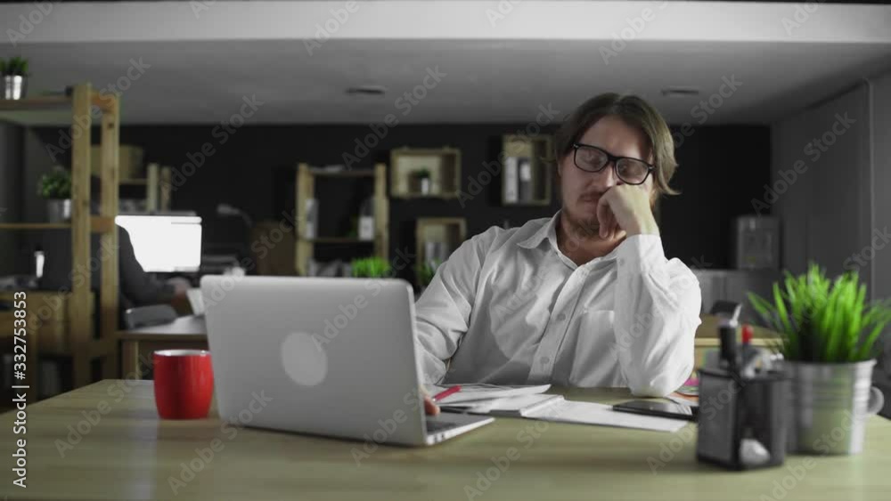 Young manager is sleeping at the office in working time Young manager is sleeping at the office in working time