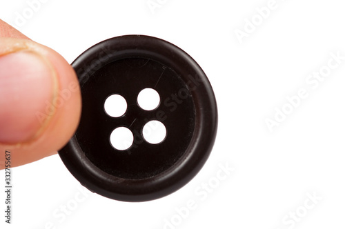 Clothes button isolated on white background. Copy space
