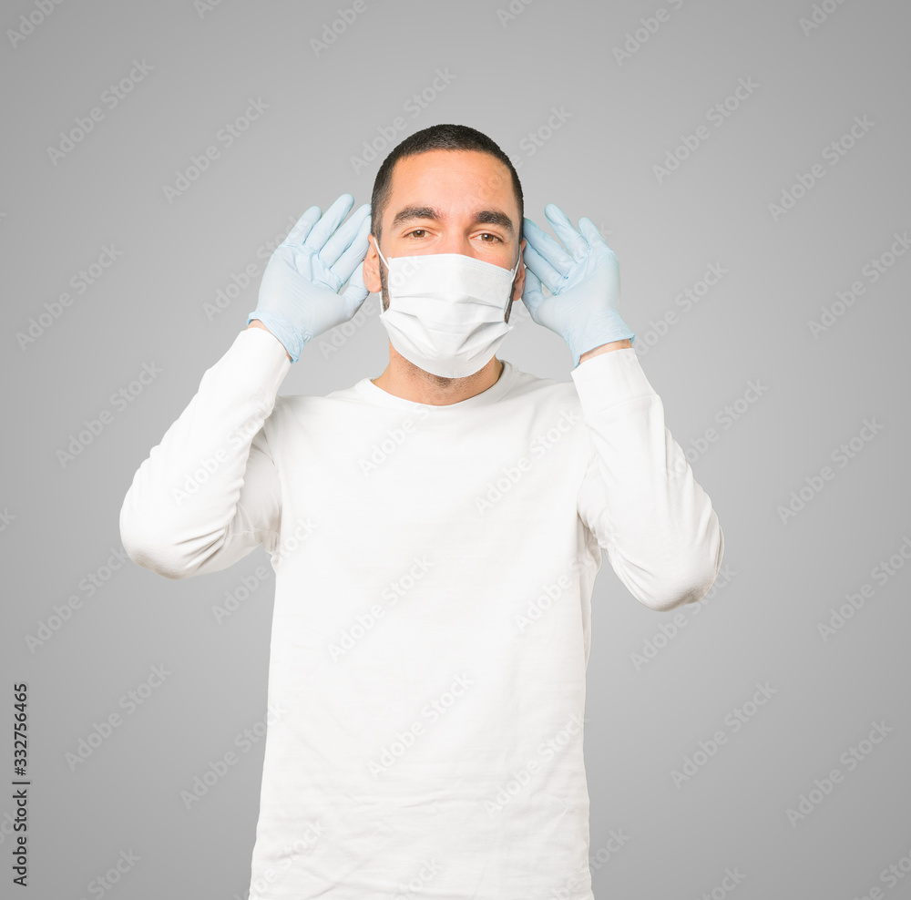 Coronavirus.Young man doing concepts and wearing mask and protective gloves Coronavirus.Young man doing concepts and wearing mask and protective gloves