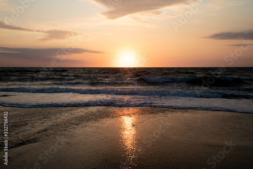 sunset on the beach © OneManJoe